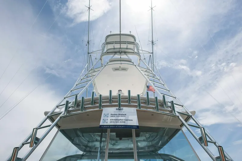 Terrabbean Yacht Photos Pics 2015 Viking 52 Open yacht, viewed from below, against a cloudy sky.