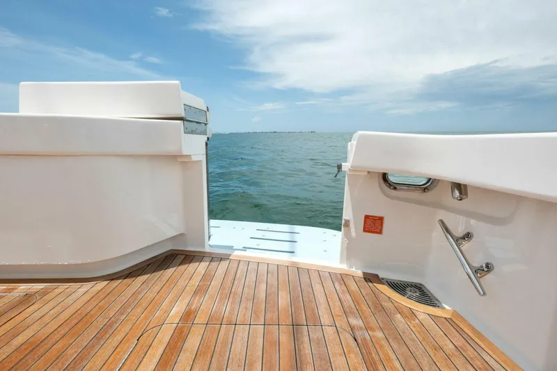 Terrabbean Yacht Photos Pics Viking 52 Open 2015 yacht deck with ocean view and wooden flooring.