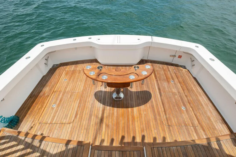 Terrabbean Yacht Photos Pics 2015 Viking 52 Open yacht deck with teak flooring and fishing rod holders.