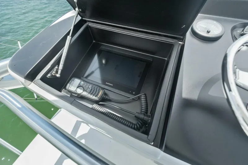 Terrabbean Yacht Photos Pics 2015 Viking 52 Open yacht dashboard with Garmin navigation and communication equipment.