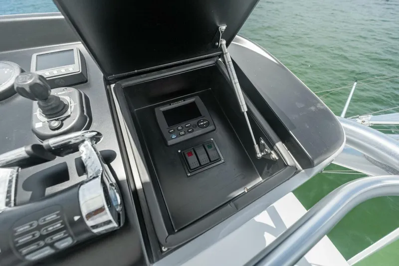 Terrabbean Yacht Photos Pics Control panel on 2015 Viking 52 Open yacht, featuring navigation and throttle controls.