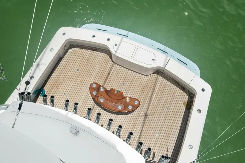 Terrabbean Yacht Photos Pics 2015 Viking 52 Open yacht deck with teak flooring and rod holders.