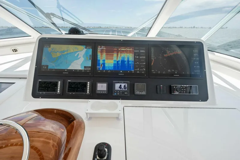 Terrabbean Yacht Photos Pics Helm of 2015 Viking 52 Open yacht with advanced navigation displays.