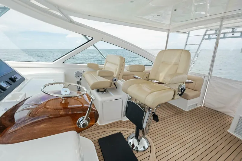 Terrabbean Yacht Photos Pics Luxurious 2015 Viking 52 Open yacht interior with leather seats and ocean view.