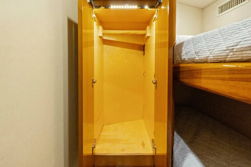 Terrabbean Yacht Photos Pics Empty wooden closet in 2015 Viking 52 Open yacht interior.