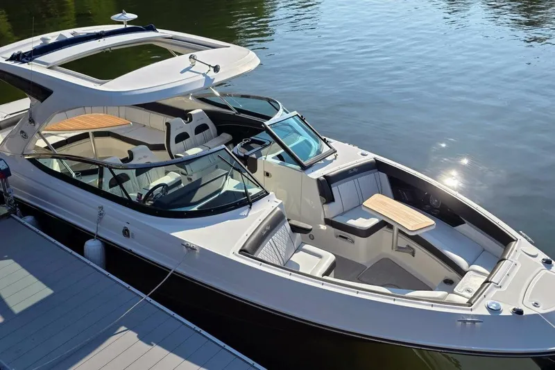  Yacht Photos Pics 2019 Sea Ray 350 SLX luxury boat docked on calm water.