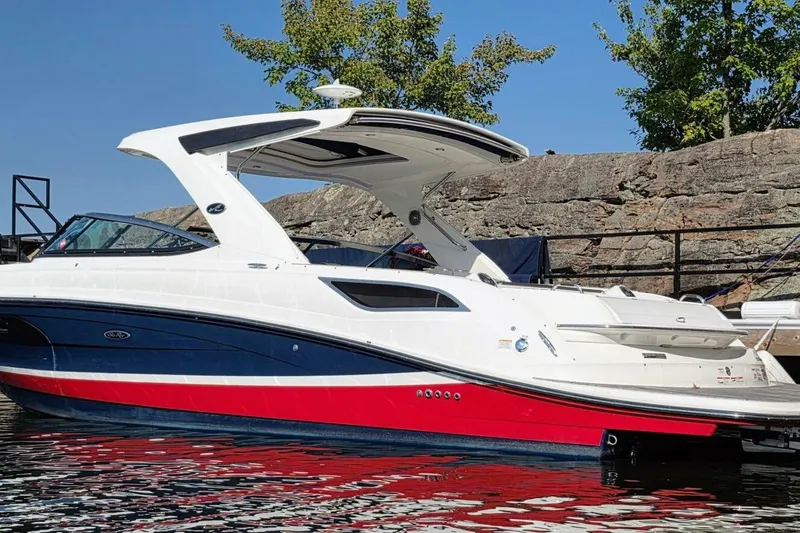  Yacht Photos Pics 2019 Sea Ray 350 SLX boat docked, featuring sleek design and vibrant colors.