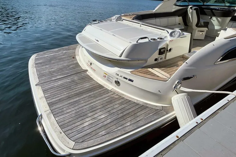  Yacht Photos Pics 2019 Sea Ray 350 SLX boat with spacious deck and luxurious seating.