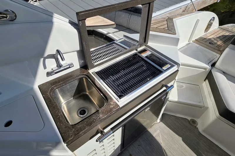  Yacht Photos Pics 2019 Sea Ray 350 SLX boat with outdoor sink and grill station.