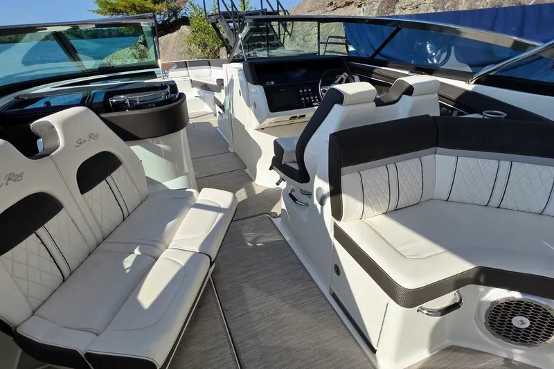  Yacht Photos Pics Luxurious interior of 2019 Sea Ray 350 SLX boat with elegant seating and modern design.