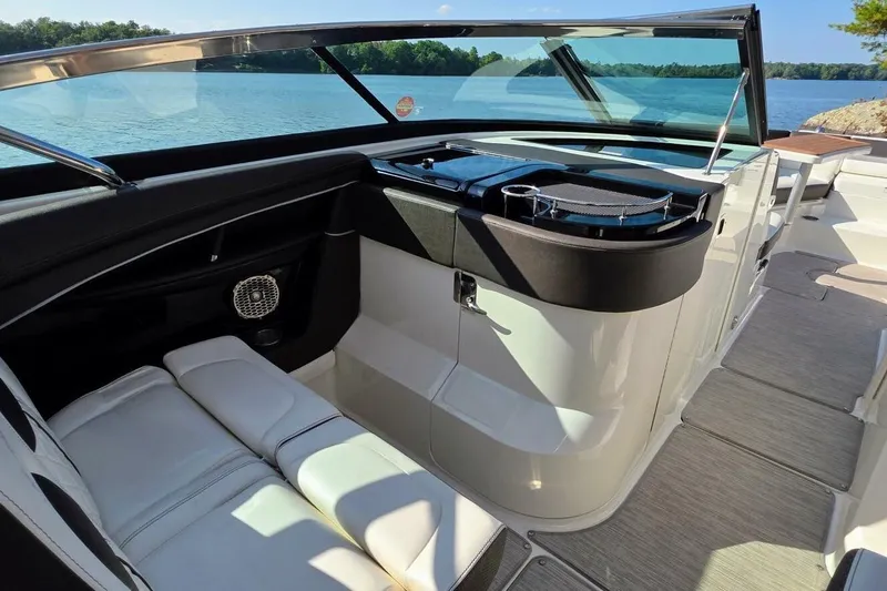  Yacht Photos Pics 2019 Sea Ray 350 SLX boat interior with seating and lake view.