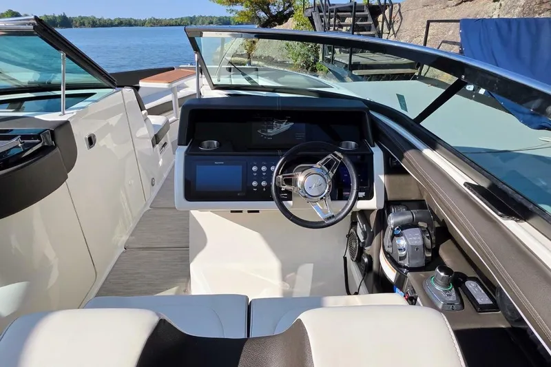  Yacht Photos Pics 2019 Sea Ray 350 SLX boat cockpit with modern steering and control panel.
