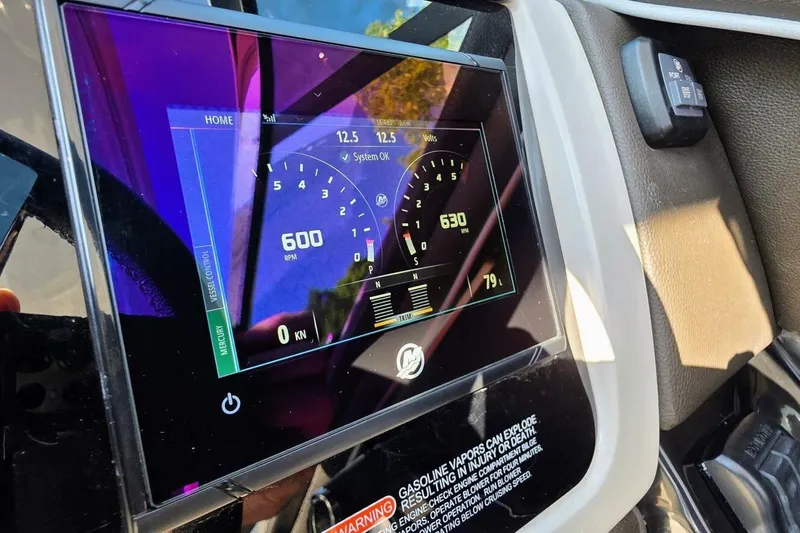  Yacht Photos Pics Dashboard of a 2019 Sea Ray 350 SLX boat showing RPM and system status.