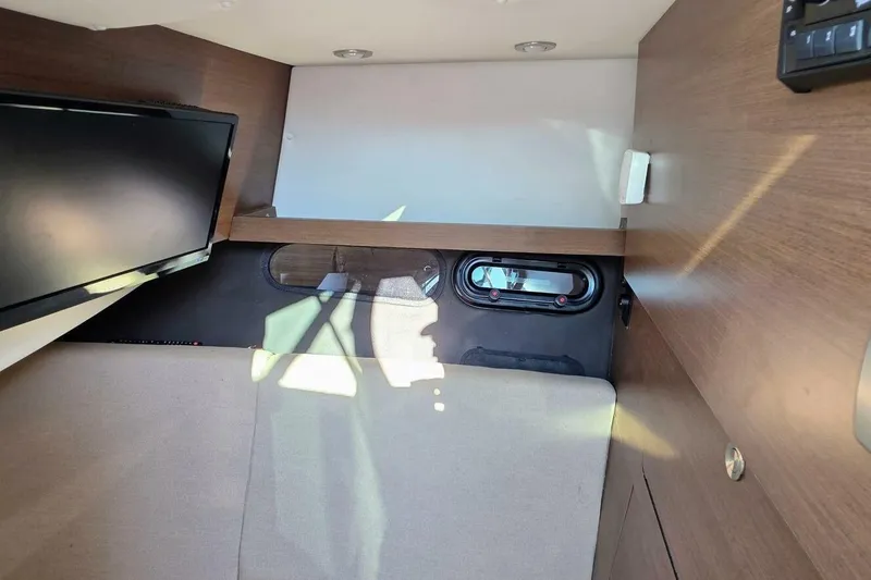  Yacht Photos Pics Interior cabin of 2019 Sea Ray 350 SLX boat with TV and window.