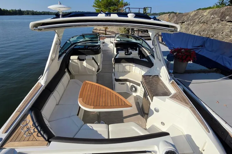  Yacht Photos Pics 2019 Sea Ray 350 SLX luxury boat interior with seating and wooden table.