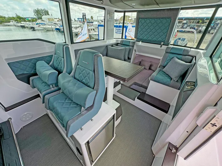  Yacht Photos Pics Luxurious interior of 2024 Axopar 37XC CROSS CABIN with plush seating and modern design.