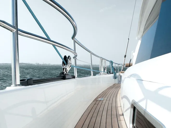  Yacht Photos Pics Sleek Moody 54 DS yacht deck, 2025 model, cruising on open water.