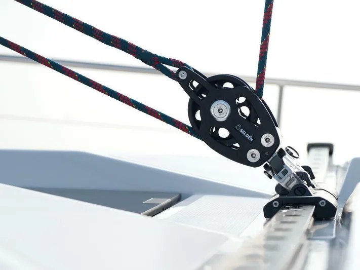  Yacht Photos Pics Close-up of a 2025 Moody 54 DS sailboat pulley system with ropes.