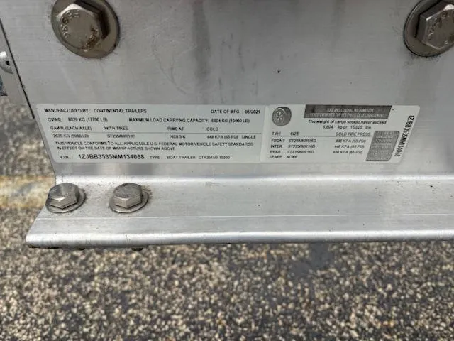  Yacht Photos Pics Close-up of a trailer identification plate with specifications and manufacturing details.