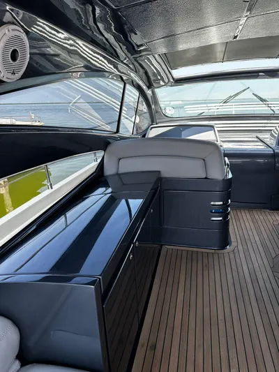 Lupo Yacht Photos Pics 2009 Pershing 56 yacht interior with sleek design and wooden flooring.