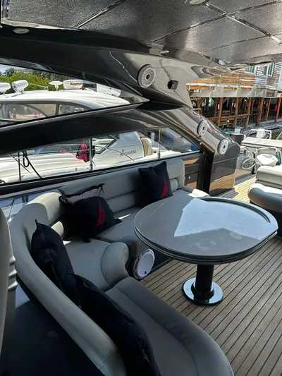 Lupo Yacht Photos Pics Luxurious 2009 Pershing 56 yacht with elegant seating and modern design.
