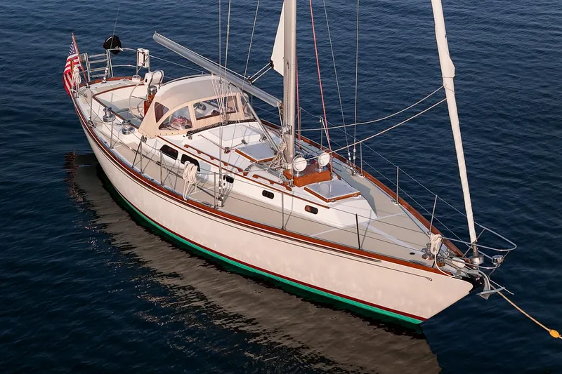 Loon Yacht Photos Pics 1988 Hinckley Sou'wester 42 sailboat on calm water, showcasing elegant design and craftsmanship.