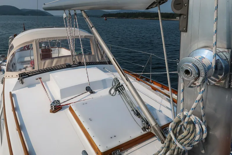 Loon Yacht Photos Pics 1988 Hinckley Sou'wester 42 sailboat deck with rigging, sailing on calm waters.