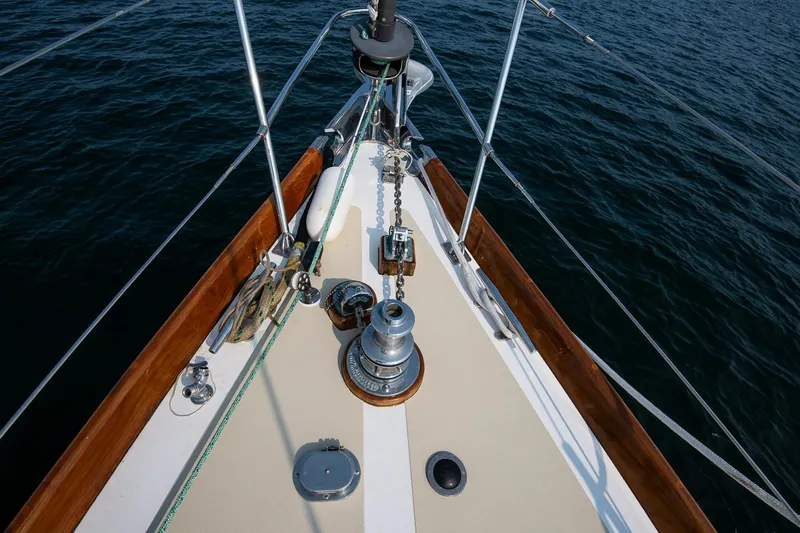Loon Yacht Photos Pics Bow of 1988 Hinckley Sou'wester 42 sailboat with winch and ropes on deck.