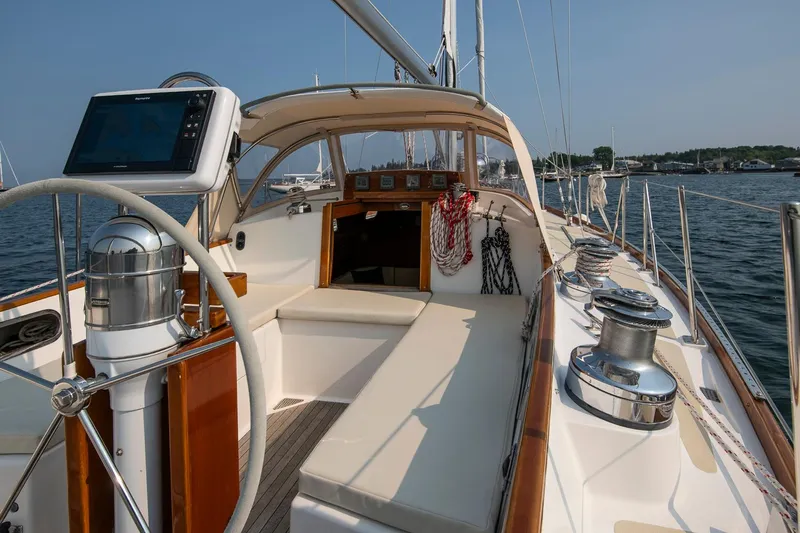 Loon Yacht Photos Pics 1988 Hinckley Sou'wester 42 sailboat cockpit with steering wheel and navigation equipment.