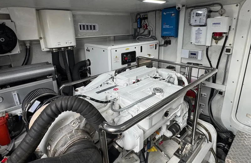 Oasis Yacht Photos Pics Engine room of 2021 Outer Reef Trident 620 yacht, featuring advanced machinery and equipment.