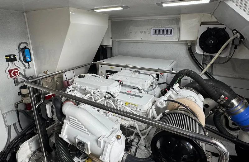 Oasis Yacht Photos Pics Engine room of 2021 Outer Reef Trident 620 yacht, featuring modern equipment and clean design.