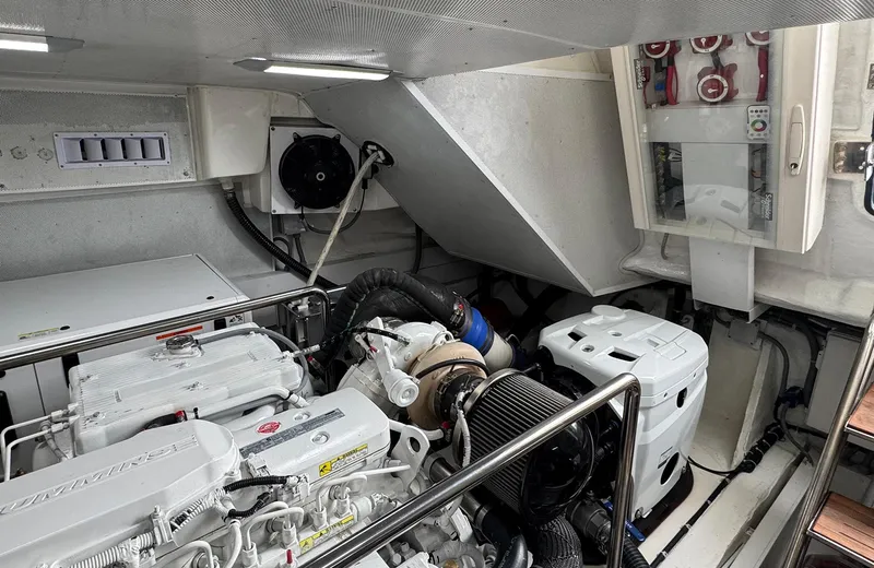 Oasis Yacht Photos Pics Engine room of 2021 Outer Reef Trident 620 yacht, showcasing mechanical components and systems.