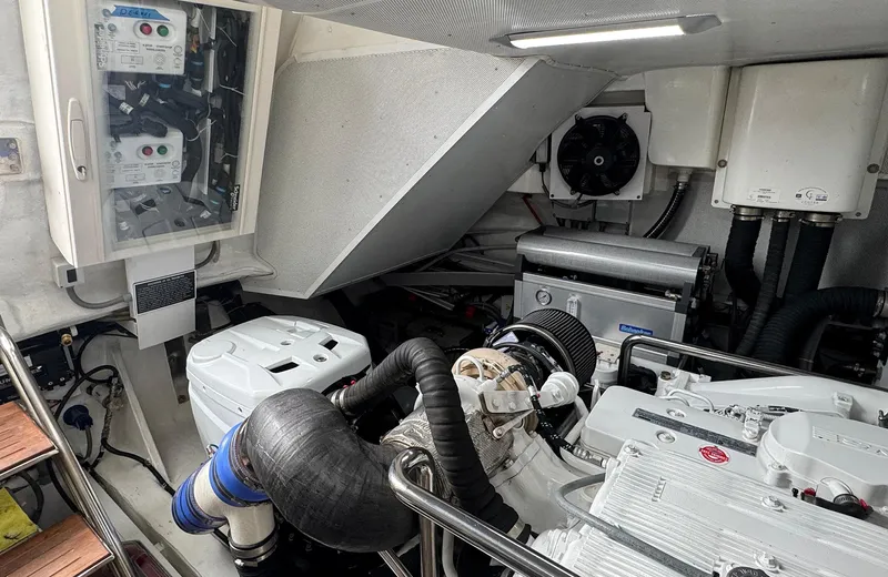 Oasis Yacht Photos Pics Engine room of 2021 Outer Reef Trident 620 yacht, showcasing mechanical components and systems.