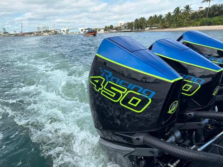  Yacht Photos Pics 2024 Statement 350 Open with Racing 450 engines on the water.