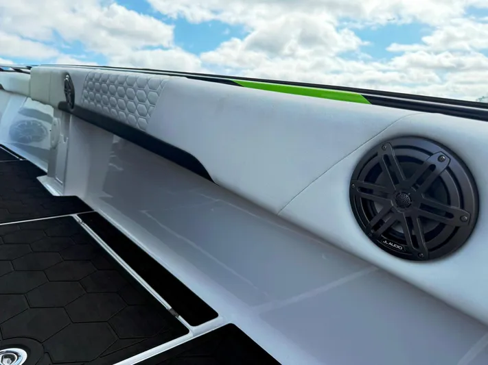  Yacht Photos Pics 2024 Statement 350 Open boat interior with speaker and quilted upholstery.