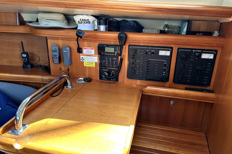 Island Myst II Yacht Photos Pics 2007 Hunter 41 Deck Salon interior with navigation equipment and control panels.