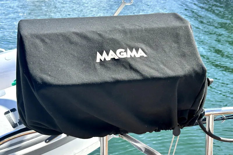Island Myst II Yacht Photos Pics Black Magma grill cover on a 2007 Hunter 41 Deck Salon boat.