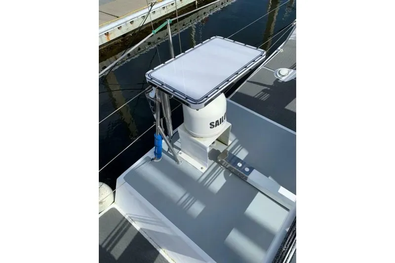 Zed4 Yacht Photos Pics 2009 Class 40 Akilaria RC2 sailboat deck with navigation equipment and railing.