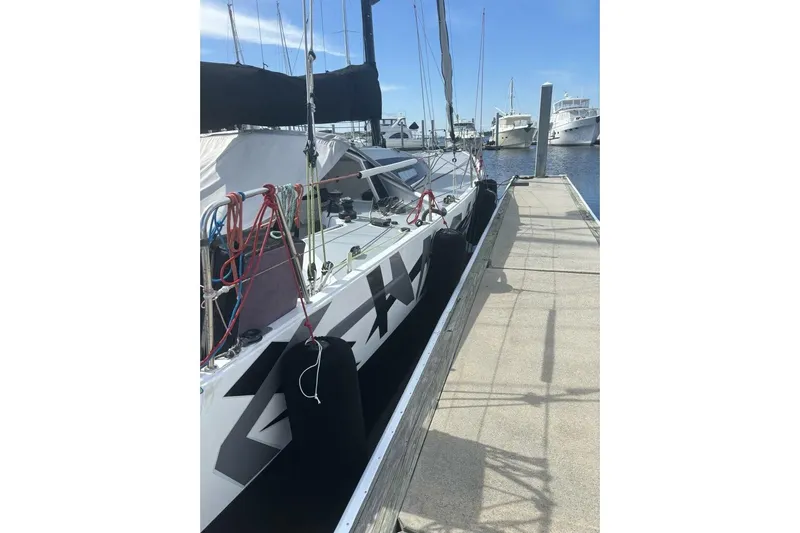 Zed4 Yacht Photos Pics Sailboat docked at marina, Class 40 Akilaria RC2, 2009 model, with visible rigging.