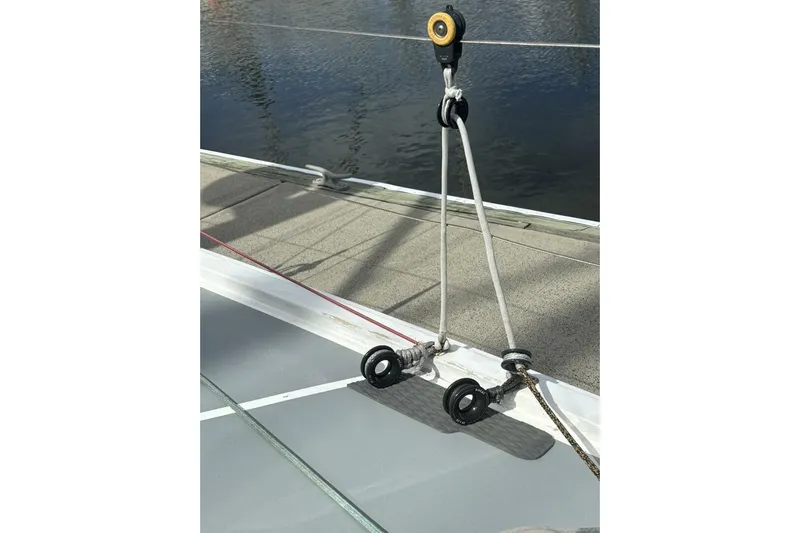 Zed4 Yacht Photos Pics Deck rigging on 2009 Class 40 Akilaria RC2 sailboat, featuring pulleys and ropes.