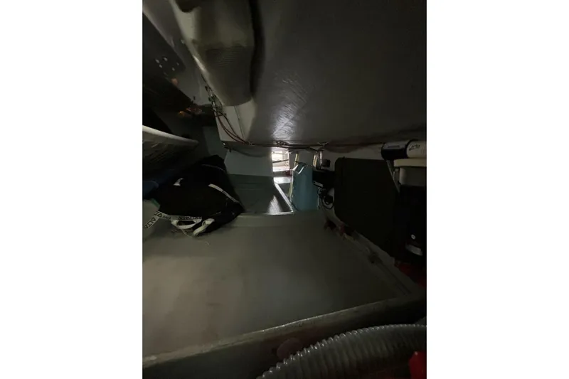 Zed4 Yacht Photos Pics Interior view of 2009 Akilaria RC2 Class 40 sailboat, showcasing compact cabin space.