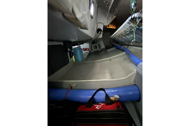 Zed4 Yacht Photos Pics Interior of 2009 Class 40 Akilaria RC2 sailboat, featuring storage and equipment.