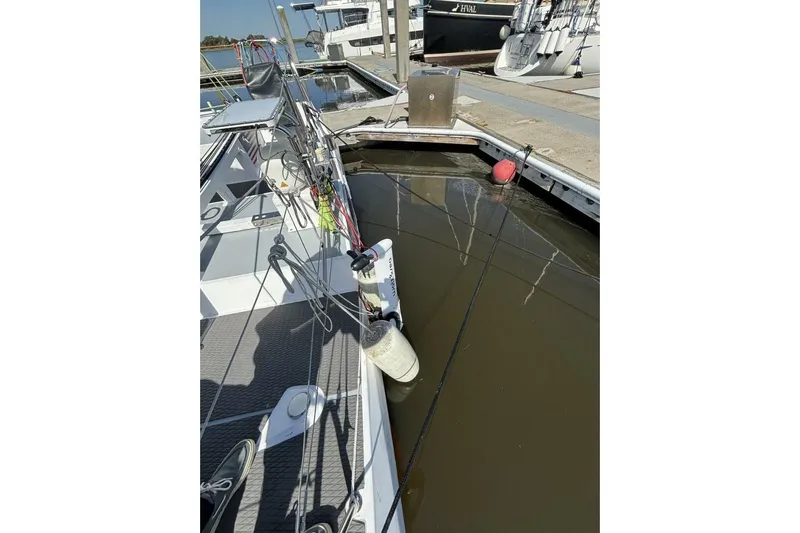 Zed4 Yacht Photos Pics Sailboat Akilaria RC2 Class 40, 2009 model, docked at marina with visible rigging.