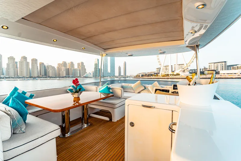 Fat Boy Yacht Photos Pics Luxurious 2020 Azimut Magellano 66 yacht interior with city skyline view.