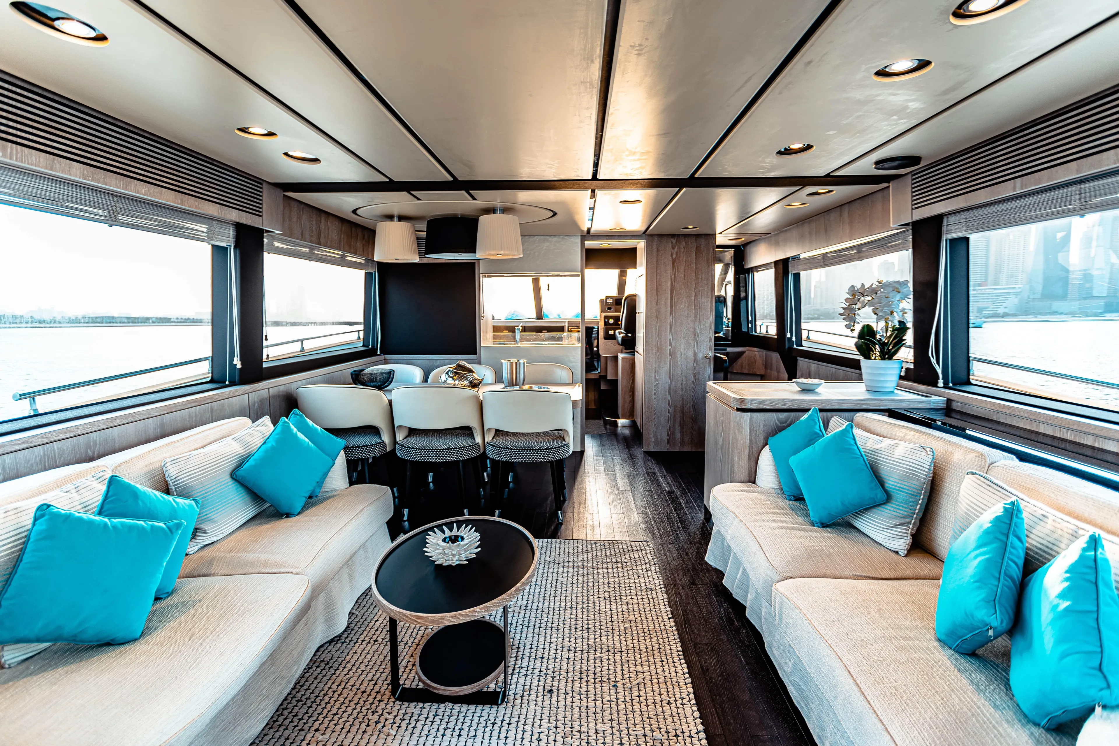 Fat Boy Yacht Photos Pics Luxurious interior of 2020 Azimut Magellano 66 yacht with elegant seating and decor.