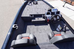 2025 Tracker Pro Team 175 boat interior with steering wheel and seating.