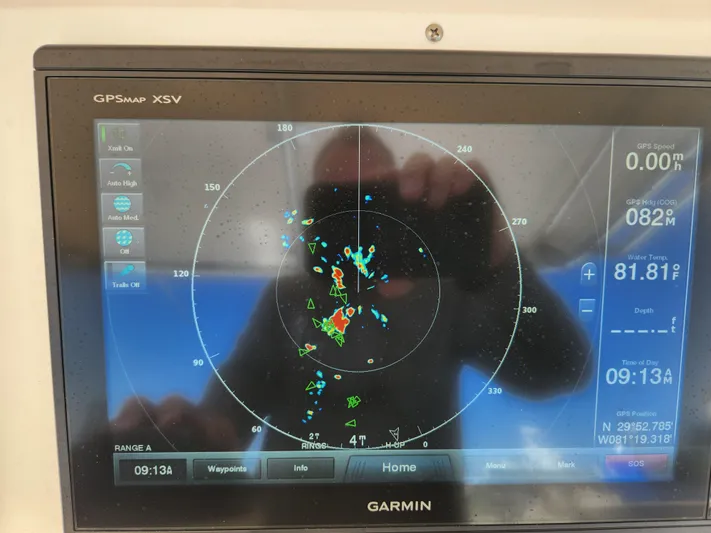  Yacht Photos Pics Garmin GPSMAP XSV display on 2008 Intrepid 323 Cuddy, showing radar and navigation data.