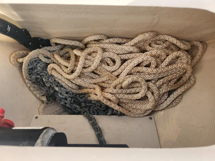  Yacht Photos Pics Coiled rope and chain in 2008 Intrepid 323 Cuddy storage compartment.