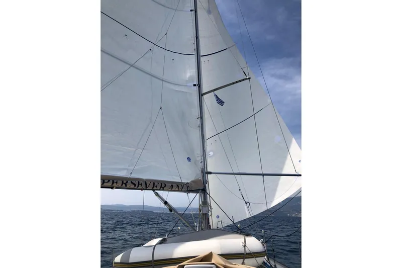 Perseverance Yacht Photos Pics Sailing on a 2012 Grand Soleil 43 yacht with full sails under a clear sky.