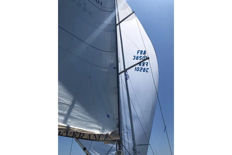 Perseverance Yacht Photos Pics Sailing yacht Grand Soleil 43, 2012 model, with sails unfurled against a clear blue sky.